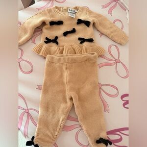 Beige Knit Baby Outfit with Black Bows